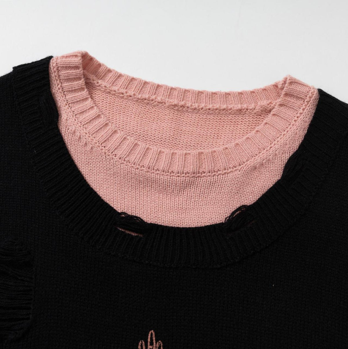 Retro fake two ripped sweaters made of old materials